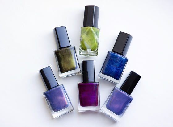 The Must-Have Guide to Creating Stunning Cat Eye Nail Art with #4 Green Gel Polish Nail Polish